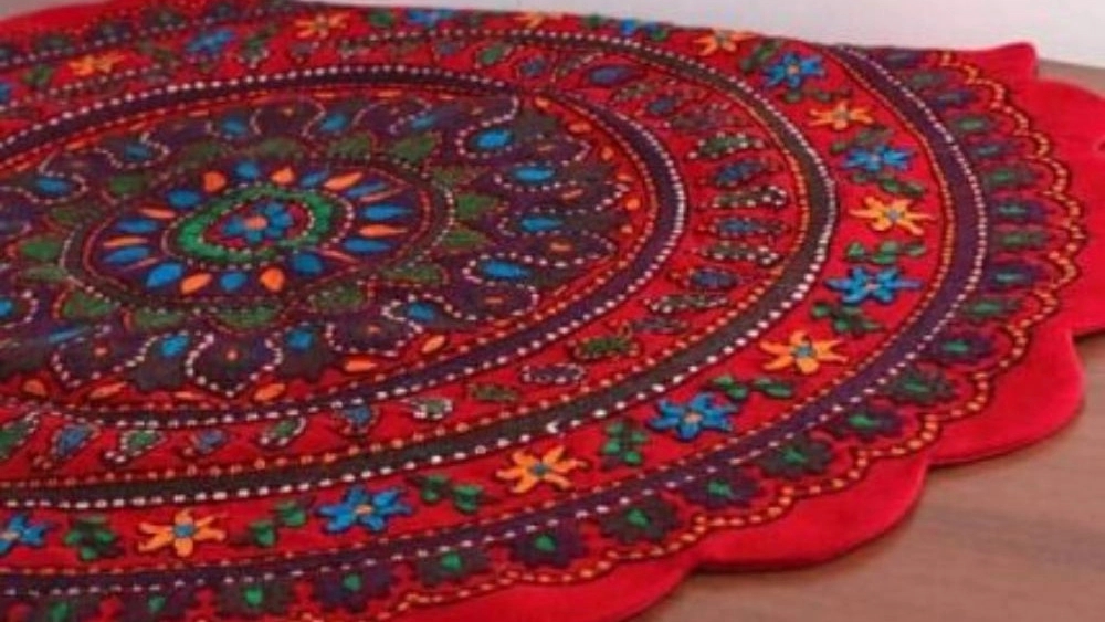 Hand-embroidered round tablecloth, a luxury selection for the home